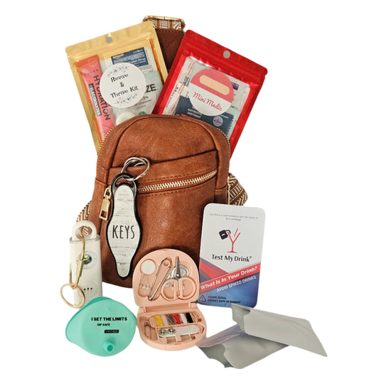 Girls' Night Out Deluxe kit with essential safety items including a personal alarm and Test My Drink kit, all in a secure crossbody leather bag.  