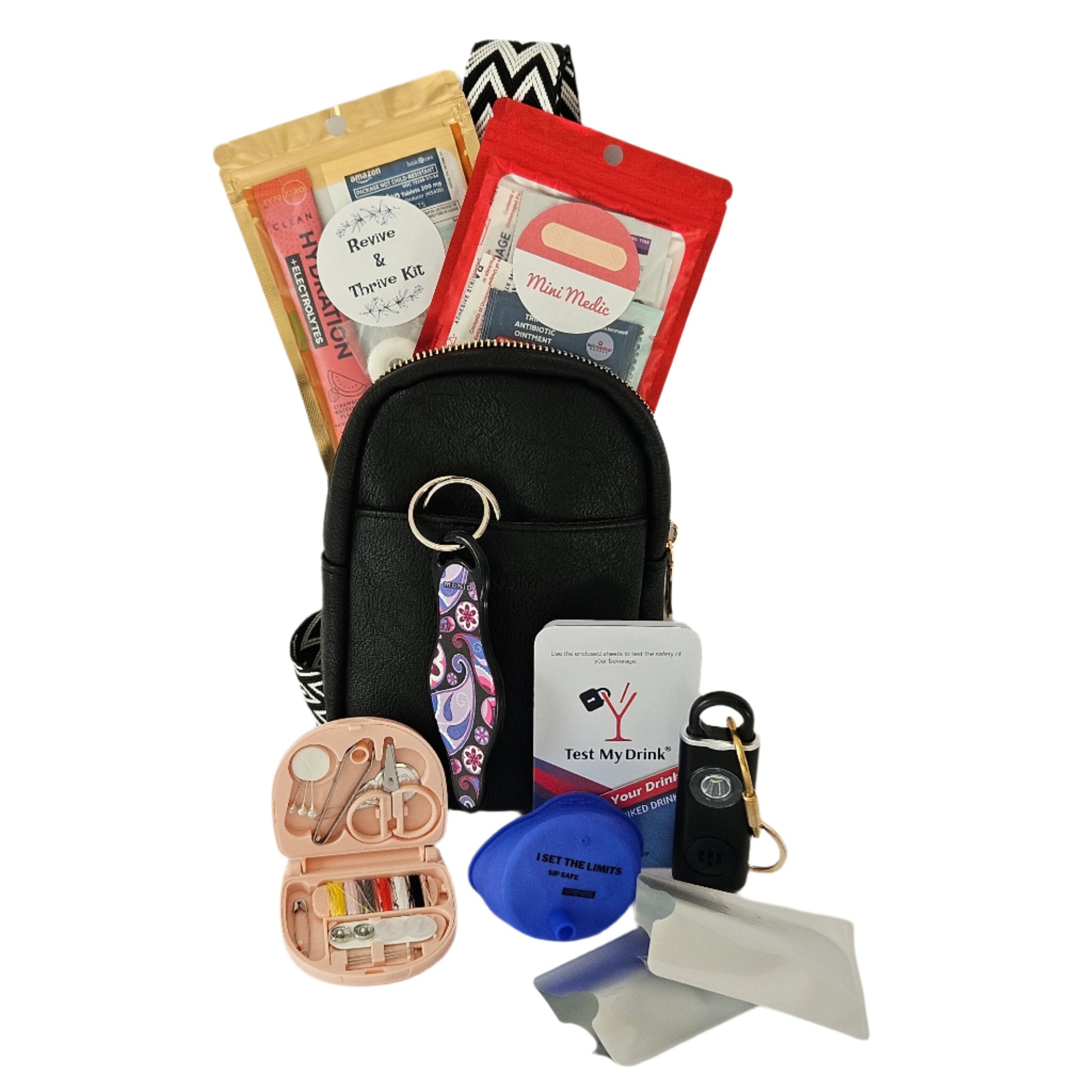 Girls' Night Out Deluxe kit with essential safety items including a personal alarm and Test My Drink kit, all in a secure crossbody leather bag.  