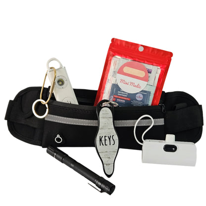 Prepared Pedestrian kit featuring safety essentials like a personal alarm, first aid kit, and a flashlight for visibility.